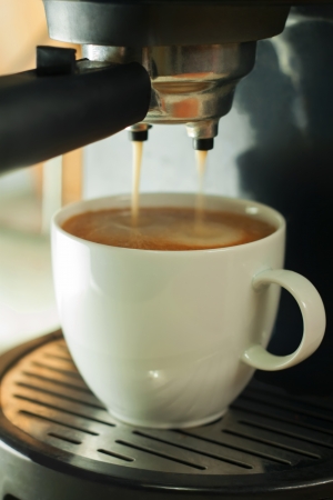 coffee machine and cup of coffeeの写真素材