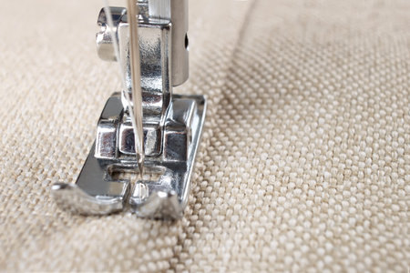 sewing machine makes a seam on fabric. sewing process