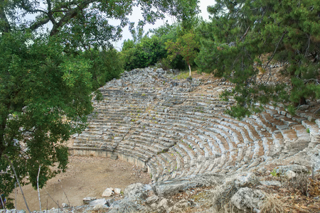 Stone amphitheater in the ancient city of Phaselis. Ancient Phaselis ruins in Turkey Kemer Antalyaの写真素材