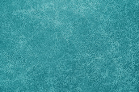 Genuine, natural, artificial turquoise leather texture background. Luxury material for header, banner, backdrop, wallpaper, clothes, furniture and interior design. environmentally friendly leatherette.の写真素材