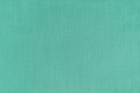 Texture background of turquoise linen fabric. Textile structure, cloth surface, weaving of natural...