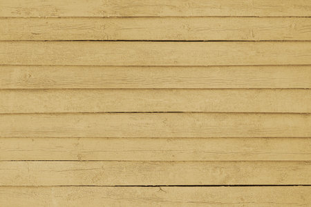 Distressed cracked wooden plank texture background. Wood weathered wall yellow surface, painted wooden panels, wallpaper, backdrop, design element.の写真素材
