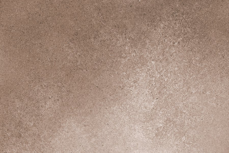Abstract grungy texture background with different shades of brown color. Painted canvas, concrete surface, studio backdrop, grainy textured effectの写真素材