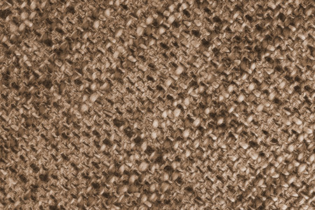 Macro, close up of brown woven burlap fabric, cloth texture with thick threads and rough textile pattern. Coarse textile surface with visible fibers. Background, eco design, upholstery materialの写真素材