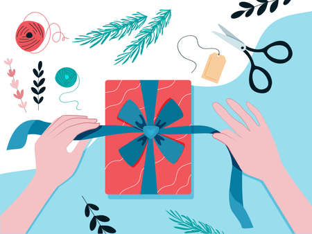 Gift wrapping. Women's hands tie a ribbon with a bow. The season of giving concept. Vector illustration in a flat style. Gift box packagingのイラスト素材
