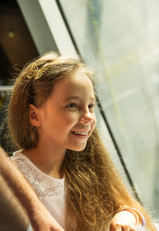 Portrait of a beautiful happy little girl closeupの写真素材
