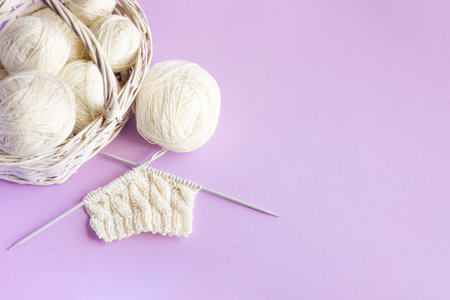 White balls of thread in a basket on a pink background, Hobbyの写真素材