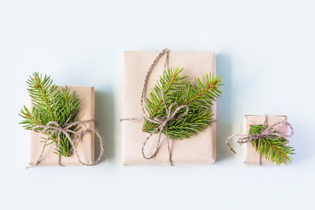 Christmas composition of a gift boxes with Christmas tree branches. Concept of New year and...