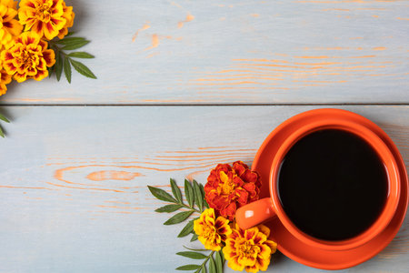 Autumn composition of red coffee cup and dahlia flowers on wooden table with place for text. Flat lay, banner. Nature conceptの写真素材
