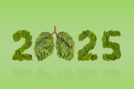 Green leaves in the shape of numbers 2025 and the lungs on a green background. New Year 2025 save it...