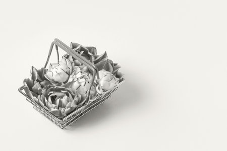 Demonstrating the colors of 2026 - Cloud Dancer. Shopping and gift basket with tulip flowers.の写真素材