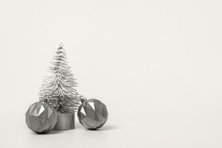 Demonstrating the colors of Cloud Dancer. Christmas background with white tree and Christmas balls on table. Christmas and New Year design holiday cardの写真素材