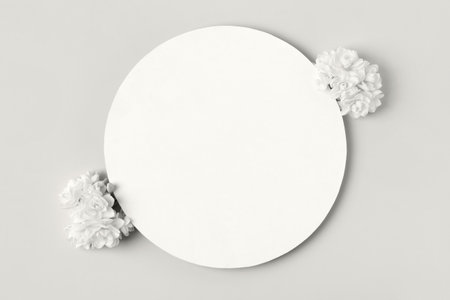 Demonstrating the colors of 2026 - Cloud Dancer. Spring flower frame made of white daffodils on gray background with a place for text in the middle. Flat lay, copy spaceの写真素材