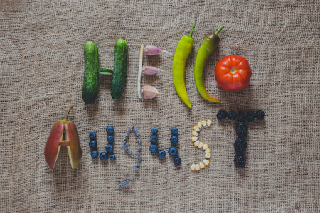 Hello august. summer gifts, vegetables and fruits, fruits from the garden, seasons, fertile August.の写真素材