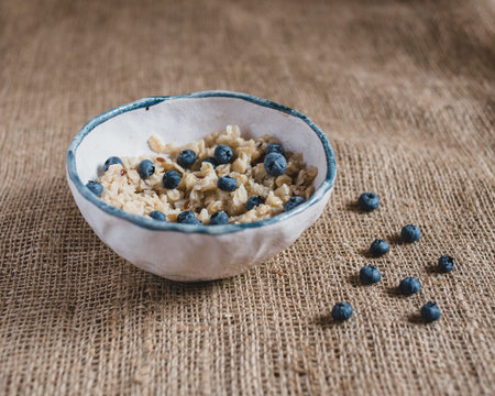 healthy breakfast. Oatmeal with blueberries, healthy foods, fresh fruits, healthy breakfast, good morning.の写真素材