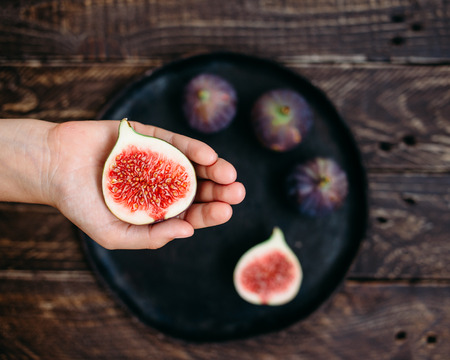 hand with figsの写真素材