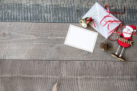 Christmas decoration on old brown wooden background.