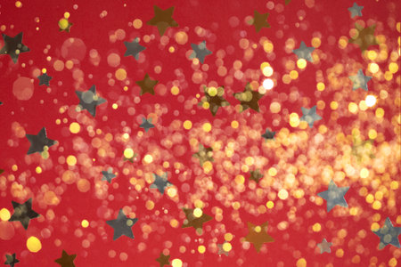 Gold and silver stars different sizes on the red background.