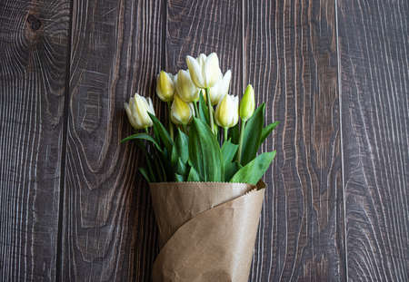 Copy space of tulips on the wooden backgroundの写真素材