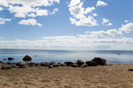 White clouds on blue sky. Sea.の写真素材