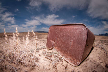 Rusty Trash In Desertの写真素材