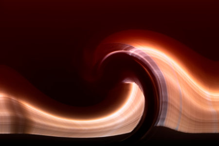 Abstract maroon background with soft curves and strong light.の写真素材