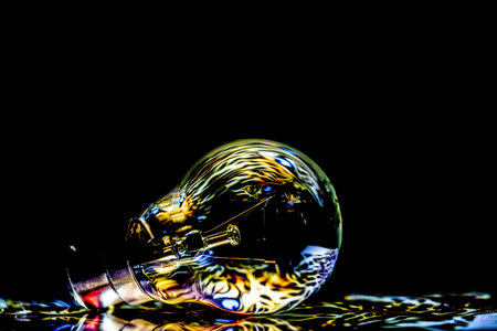 beautiful light effect on a bulb photography on a black background