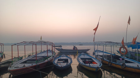An image of many boats lines up i the ghats of varanasi or kashi in early morningの写真素材