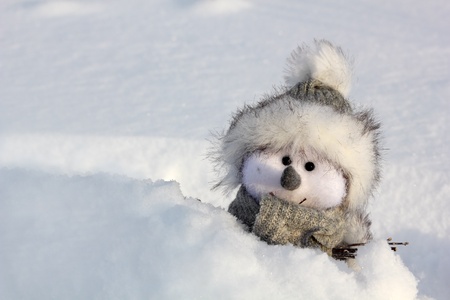 snow man toy standing close upの写真素材