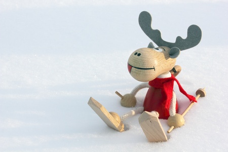 Christmas deer skier in snow, clouse upの写真素材