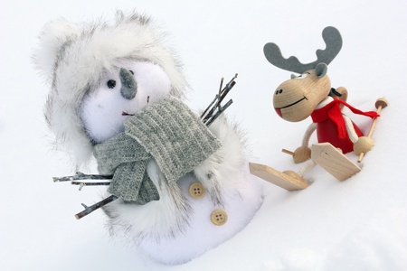 Christmas symbols: deer and snowman, close upの写真素材