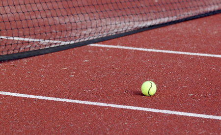 Tennis ball and net 