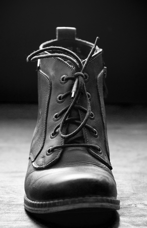 Brown leather shoes on  wooden floorの写真素材
