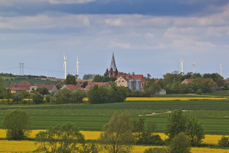 Spring landscape with yellow rape fieldの写真素材