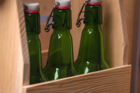 Crafting beer in bottles and glassesの写真素材