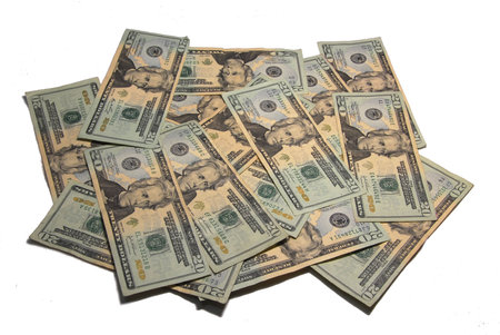 Arranged pile of money on white