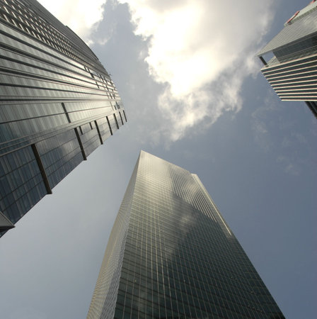 Modern Glass Skyscrapers thrust upward.