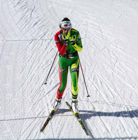 Pokljuka, Slovenia - March 9  Darya Domracheva running a warm-up lap without a rifle before the world cup competition of mass start  12,5 km  March 9, 2014 at Pokljuka, Sloveniaのeditorial素材