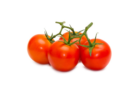 Fresh tomatoes isolated on white backgroundの写真素材