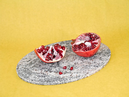 Pomegranate isolated on yellow