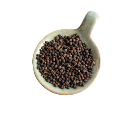 Dried black pepper isolated on white background