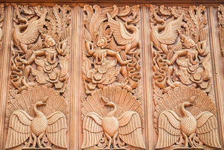 Old wooden carving in Thai styleの写真素材