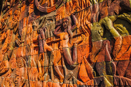 Wall sculpture illustrates the punishment in hell の写真素材
