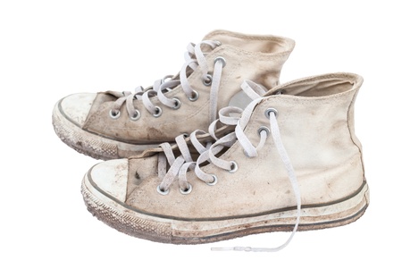 old sneakers on white background の写真素材
