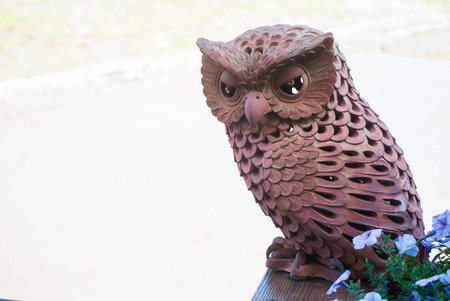 Owl made by brown clayの写真素材