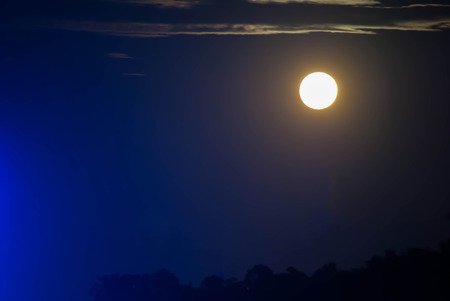 Silhouette sky with the moonlight.の写真素材