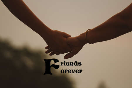 handshake between two friends (Friends Forever)の写真素材