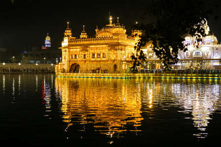 A night view of golden temple with its reflectionのeditorial素材
