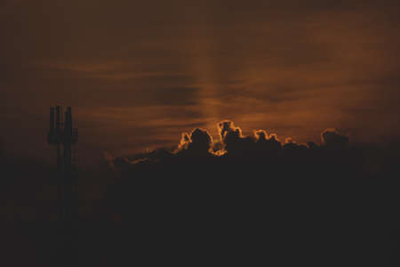 sunset scenery behind cloudsの写真素材