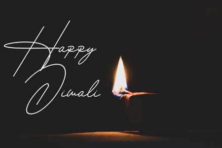 burning candle happy Diwali wishの写真素材